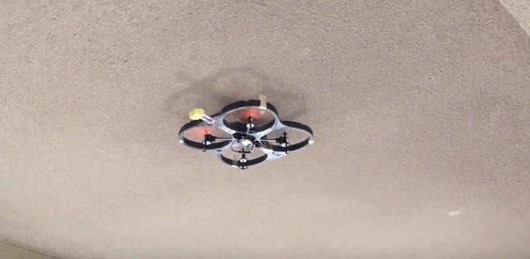 This quadcopter drone can land on ceilings and walls