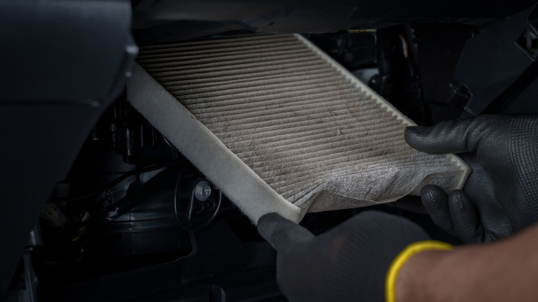 Replacing a cabin air filter in a vehicle.