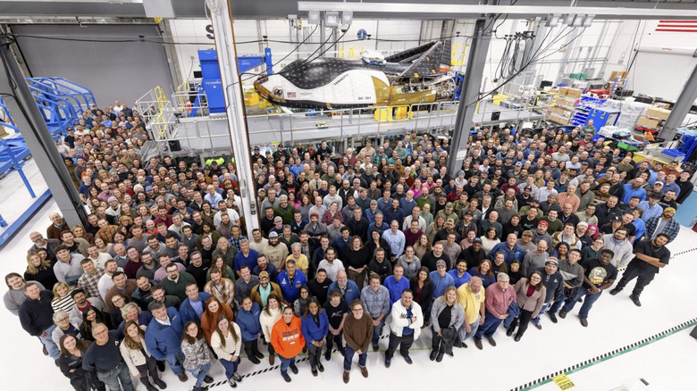 Sierra Space employees posing with the Tenacity