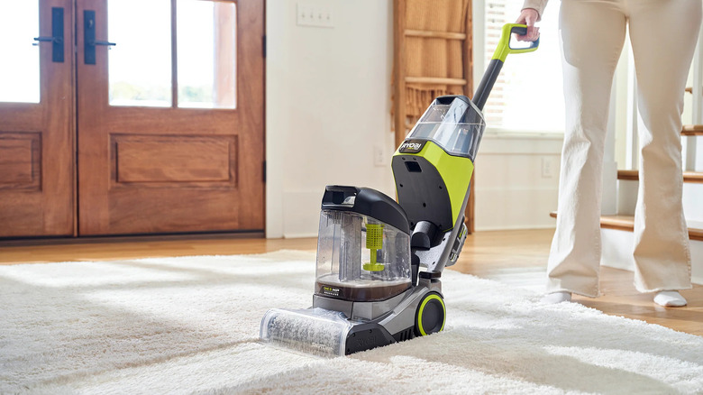 Ryobi rug and carpet cleaner cleaning a white rug