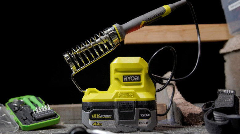 Person using corded Ryobi Soldering Station
