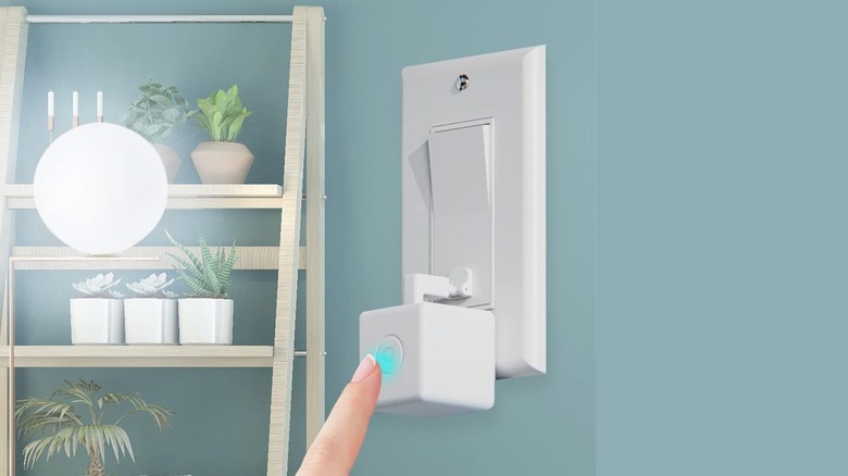 person pressing Fingerbot