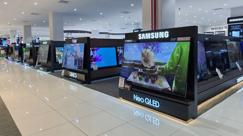 A Samsung Neo QLED TV on display alongside its competitors