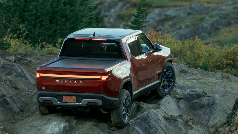 Rivian R1T on top of a rocky mountain 