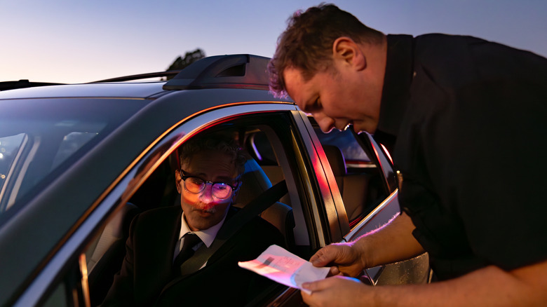 Man getting pulled over by police officer