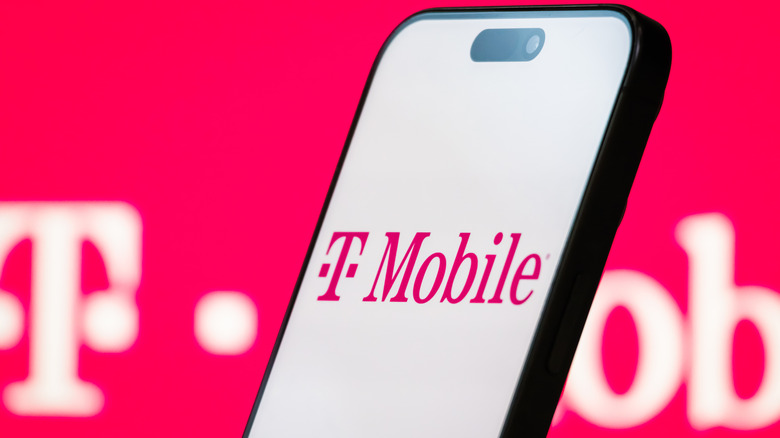 T-Mobile logo on and behind a smartphone