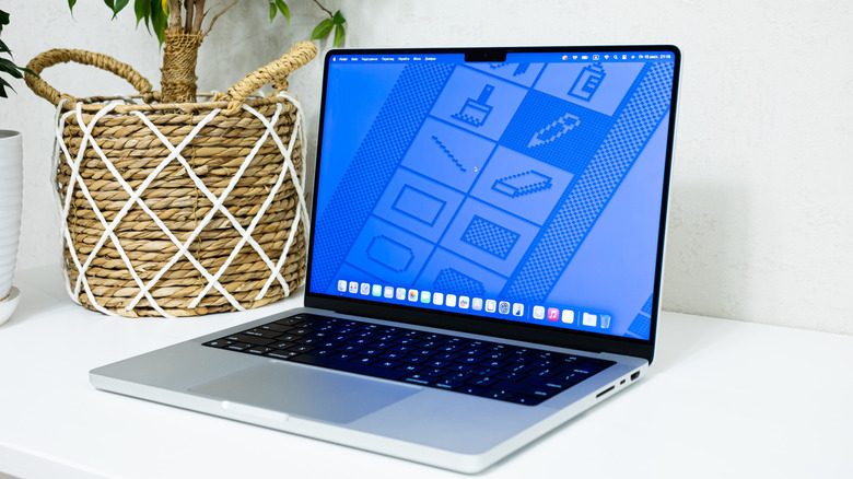 An unlocked MacBook on a flat surface