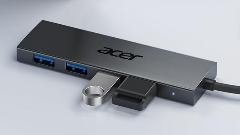 An Acer USB hub on a table.