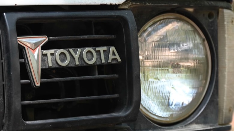 Close-up of Toyota logo on a 1980 Toyota Truck