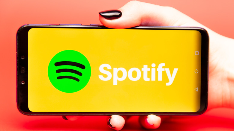 spotify logo on smartphone screen in landscape mode