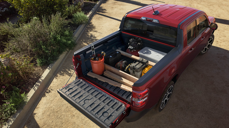 Overhead shot of red 2025 Ford Maverick bed on driveway