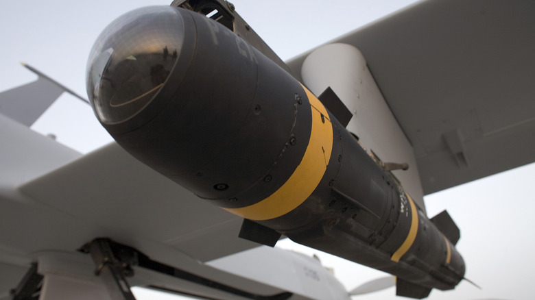 A Hellfire missile resting in the weapons bay of a US Air Force Predator drone aircraft.