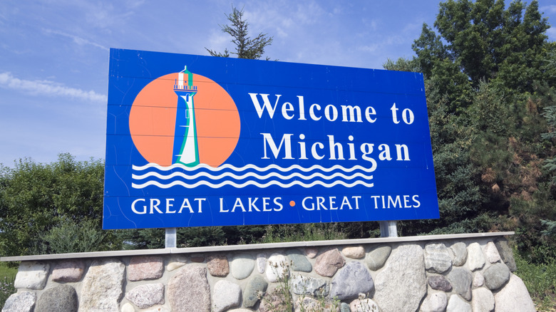 A Welcome to Michigan sign on a sunny day