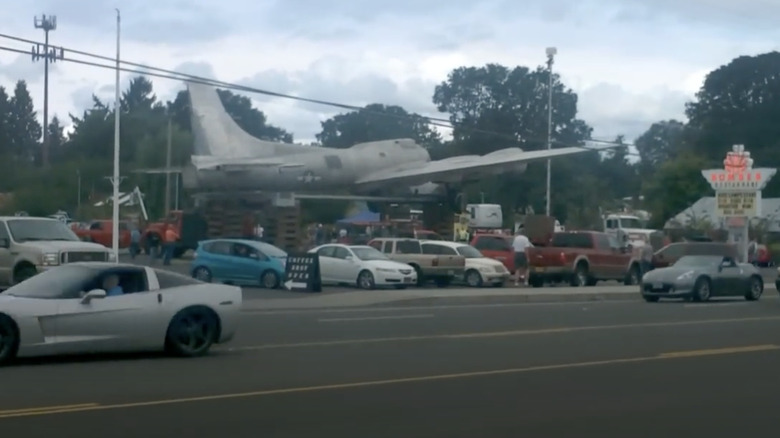 The B-17 bomber known as the Lacey Lady being put onto a truck after being removed from the gas station where it sat for decades
