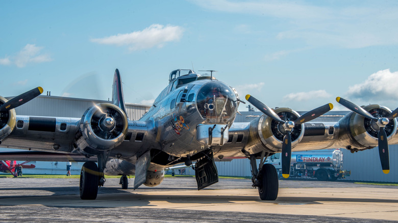 A restored Boeing B-17 bomber on the tarmac