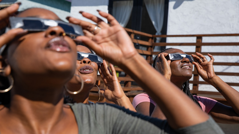 people watching a solar eclipse