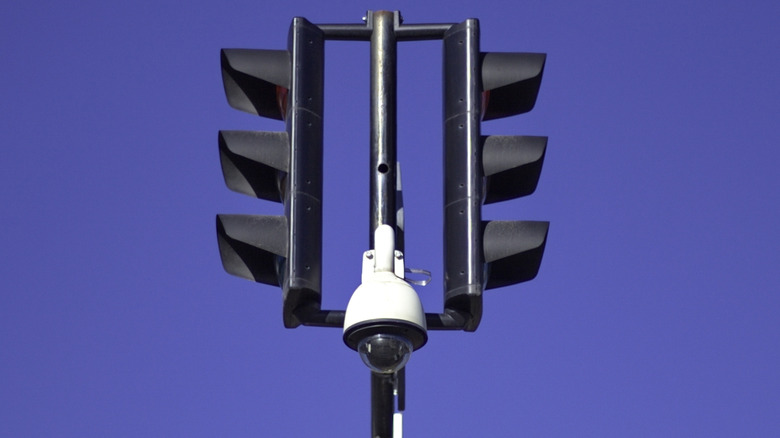 Those 'Bells' On Top Of Traffic Lights? They're Actually Cameras