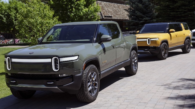 Two Rivian EVs parked driveway