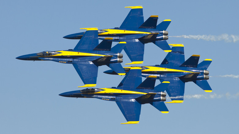Blue Angels aerial display team flying in close diamond formation