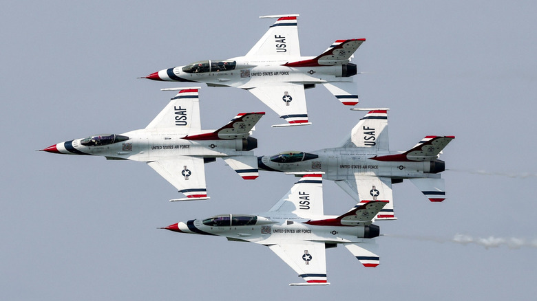 USAF Thunderbirds team flying in a tight formation