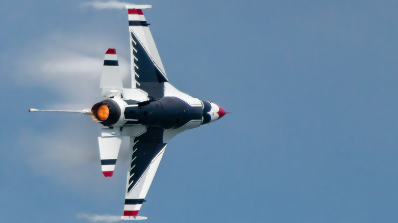 Thunderbirds jet flying an aerobatic maneuver