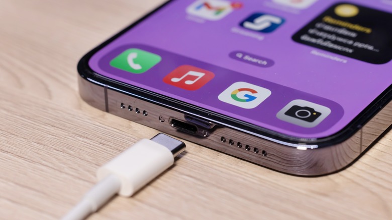 USB-C cable plugging into iPhone