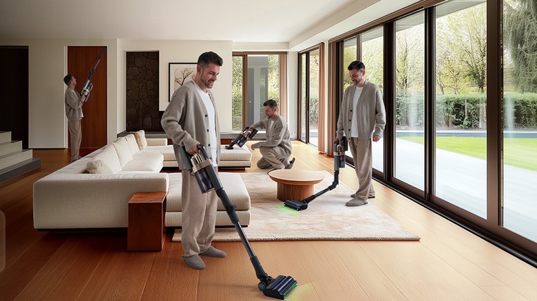 Man vacuuming floor with Tineco product