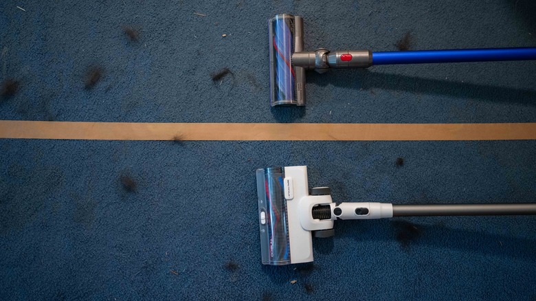 The Dyson V11 Origin and Tineco Pure One Station 5 side by side during testing.