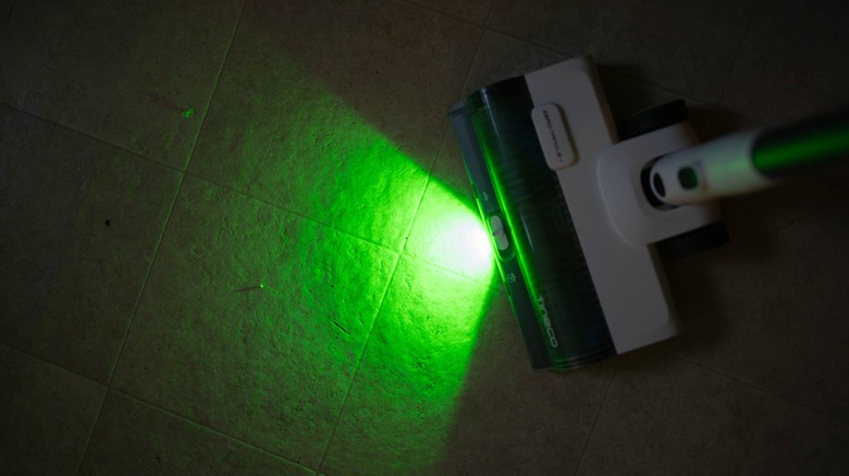 The green dust light of the Tineco Pure One Station 5.