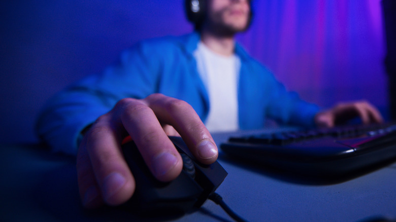 Person using gaming mouse