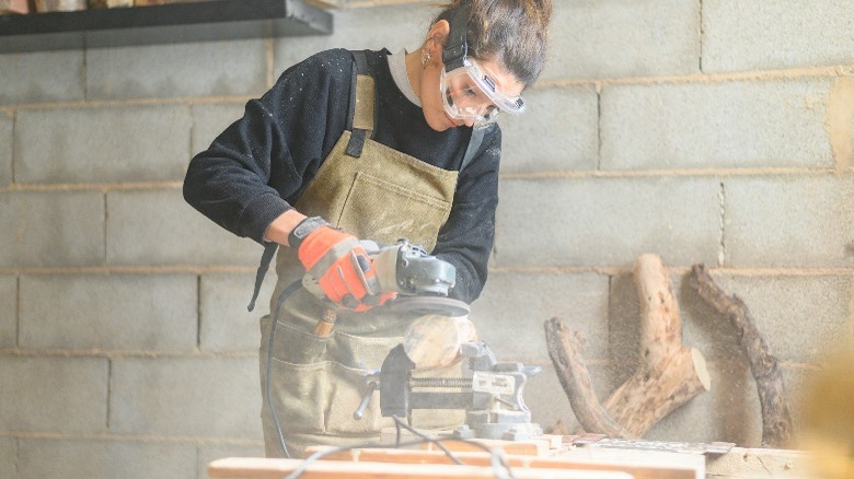 person using power tools