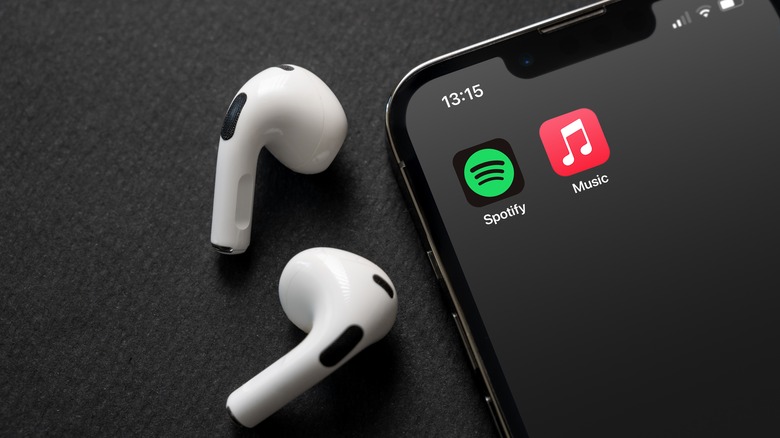 AirPods next to phone