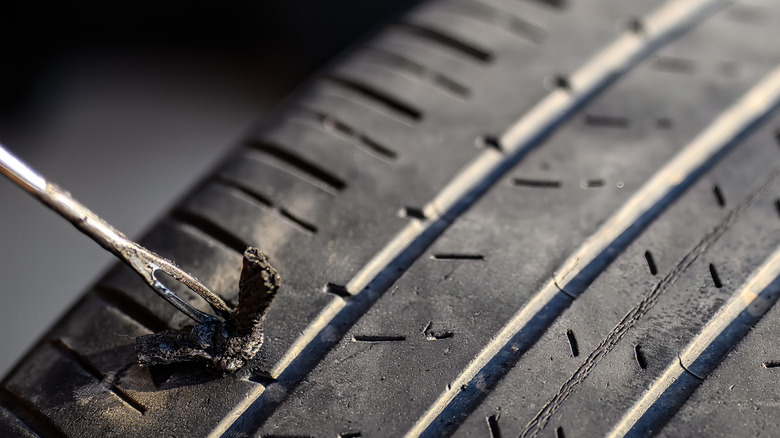 Tire plug being inserted