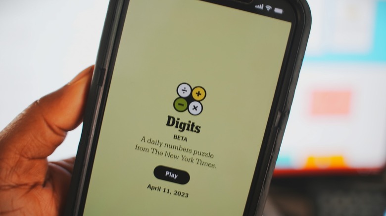 A photo of Digits game on phone