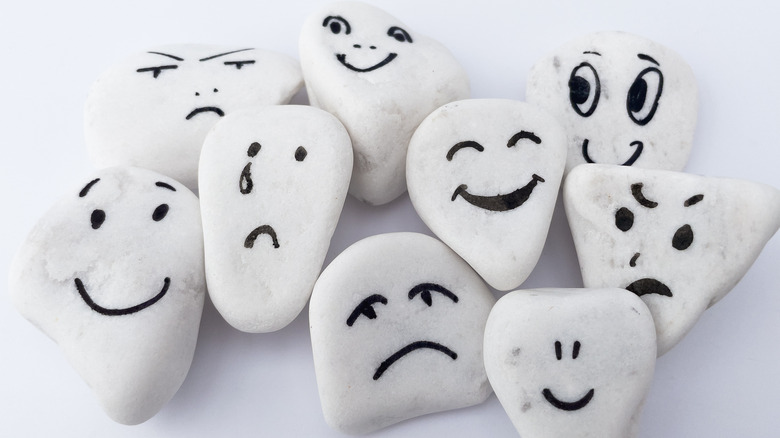 Stones depicting different emotions