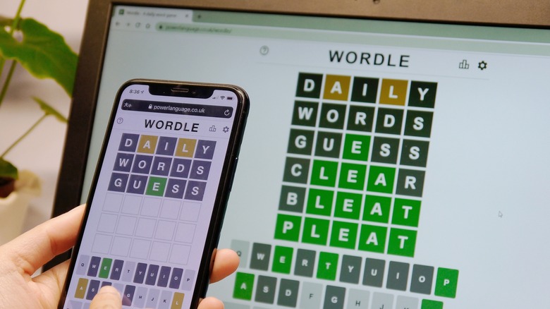 person playing Wordle on a smartphone