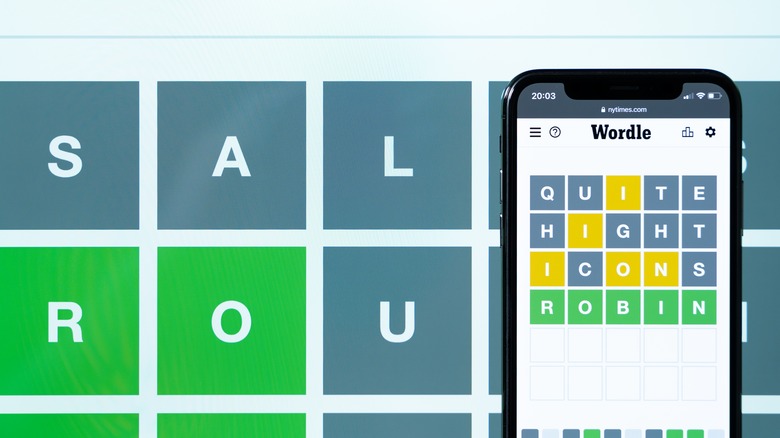 Wordle puzzle on a smartphone and a laptop