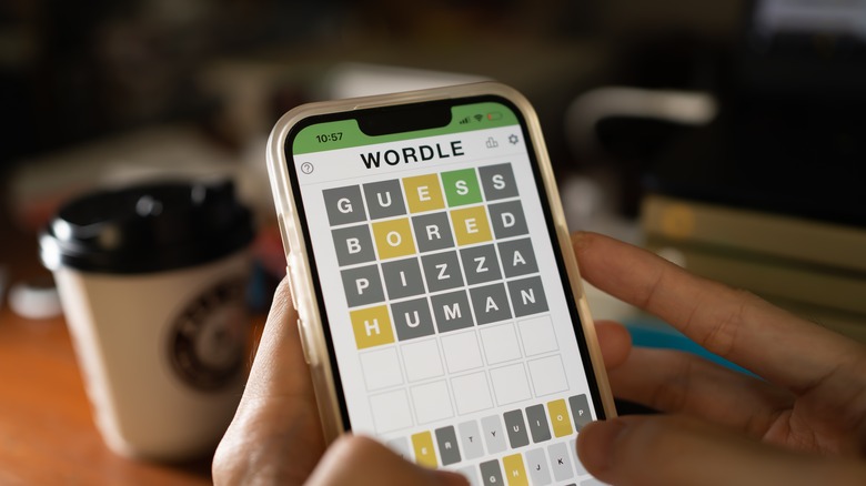 person playing Wordle on a smartphone