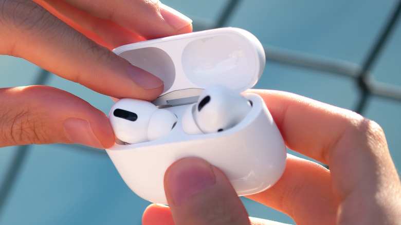 Person opening AirPods Pro case