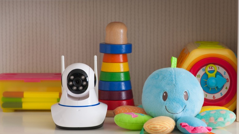 indoor camera next to colorful children toys