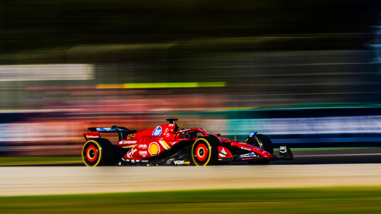 Red F1 car on track