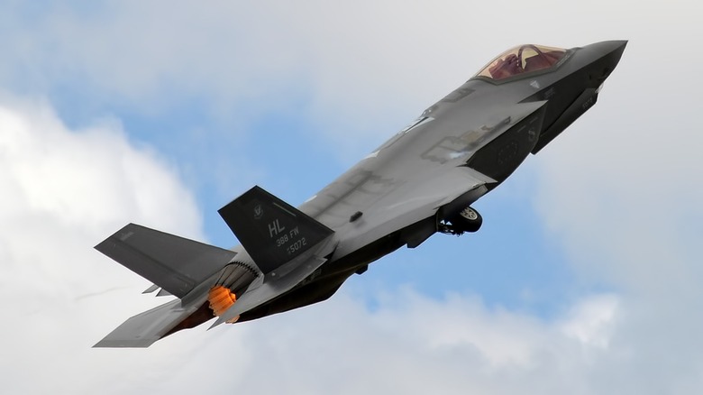 An F-35A Lightning II climbing after takeoff