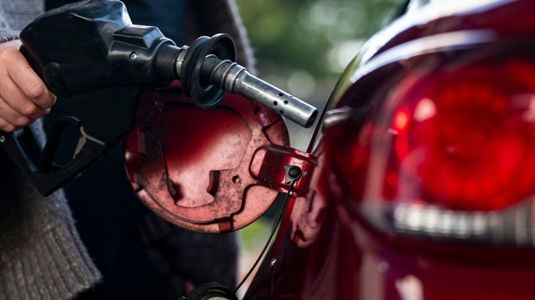 Nozzle being inserted into fuel filler neck