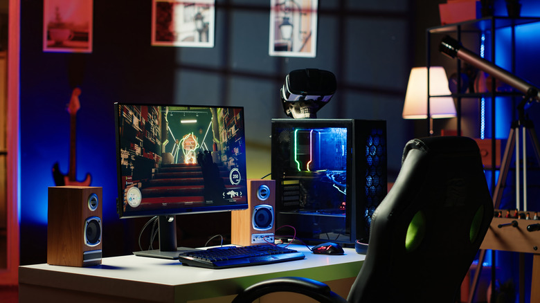 A gaming setup with a full-sized tower PC