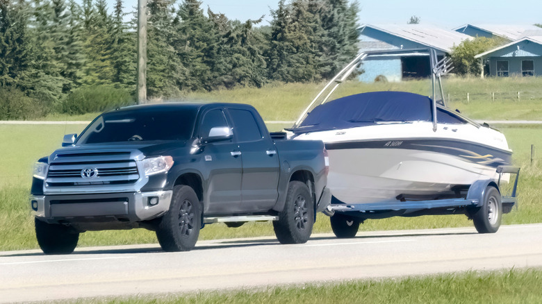 Pickup truck towing a boat