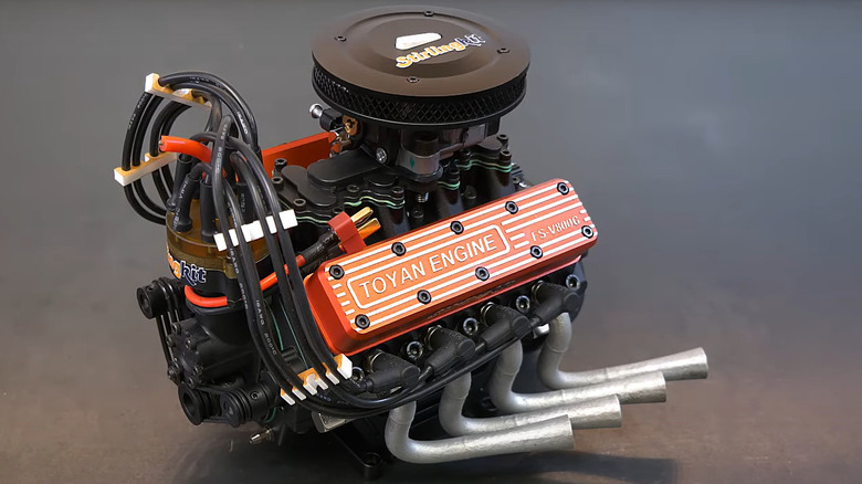 Toyan V8 1:10-scale engine on a gray surface