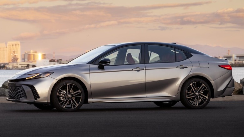 Grey 2026 Camry in the XSE trim parked near river