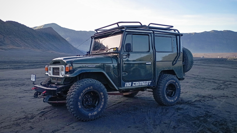 Toyota Land Cruiser FJ40 parked in mountainous terrain