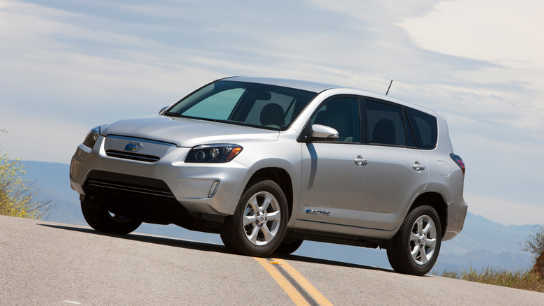 A second generation Toyota RAV4 EV in silver, front 3/4 view