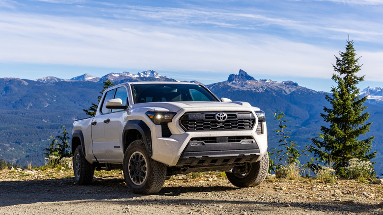 toyota tacoma on rugged mountain top trail
